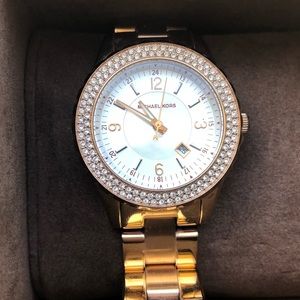Micheal Kors rose gold toned watch